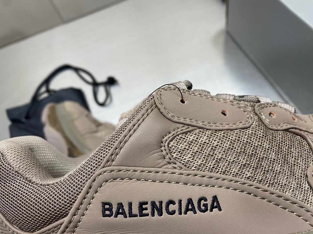 Balenciaga TRIPLE S CLEAR SOLE SNEAKER IN BROWN