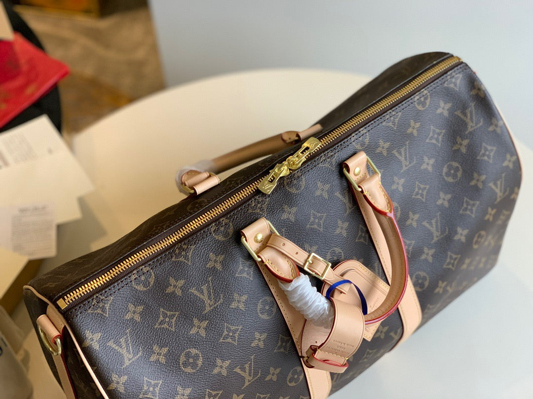 LV Keepall con bandolera monogram