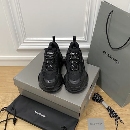 Balenciaga TRIPLE S CLEAR SOLE SNEAKER IN BLACK