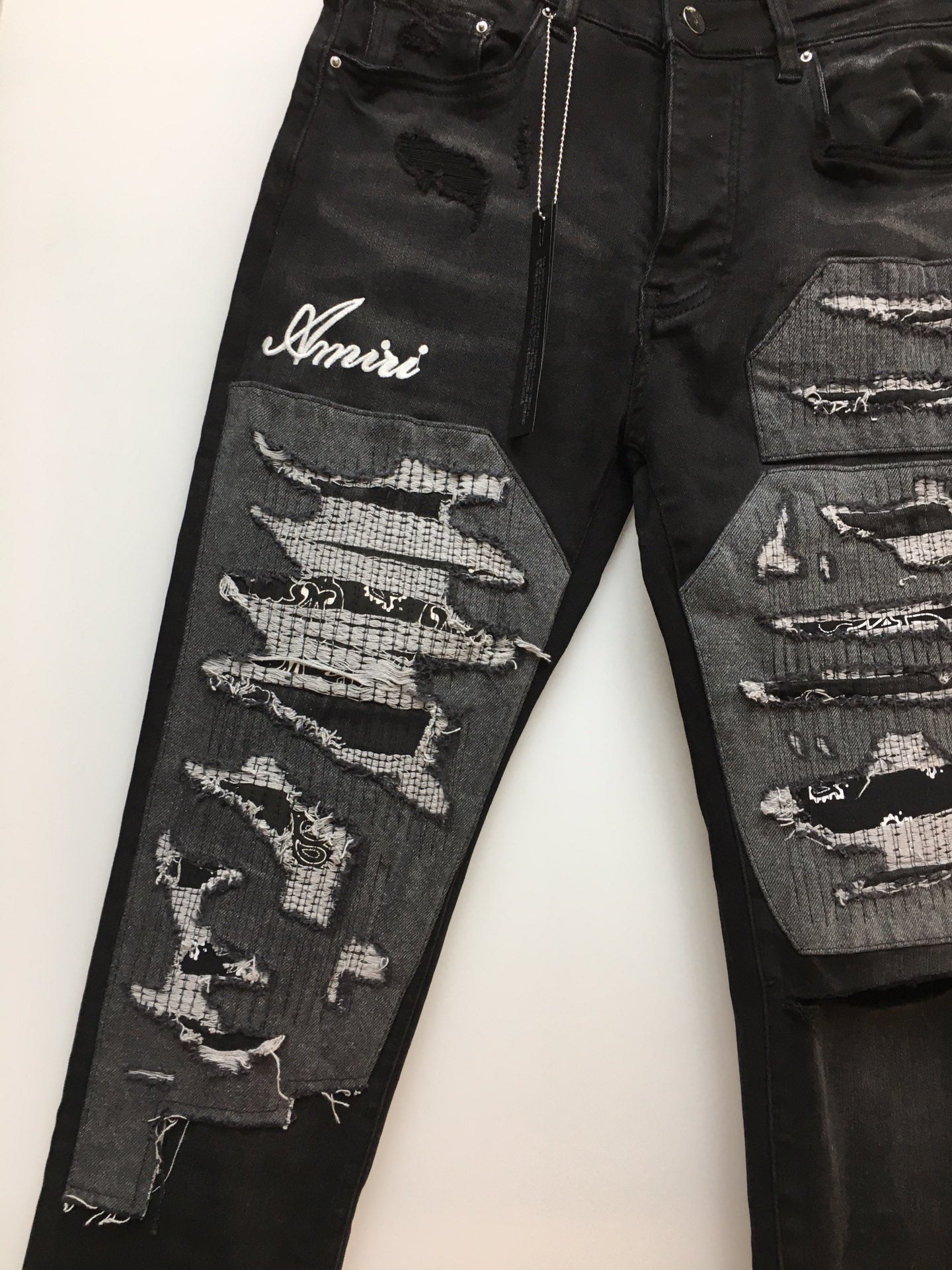 AMIRI JEANS TAPERED LEG