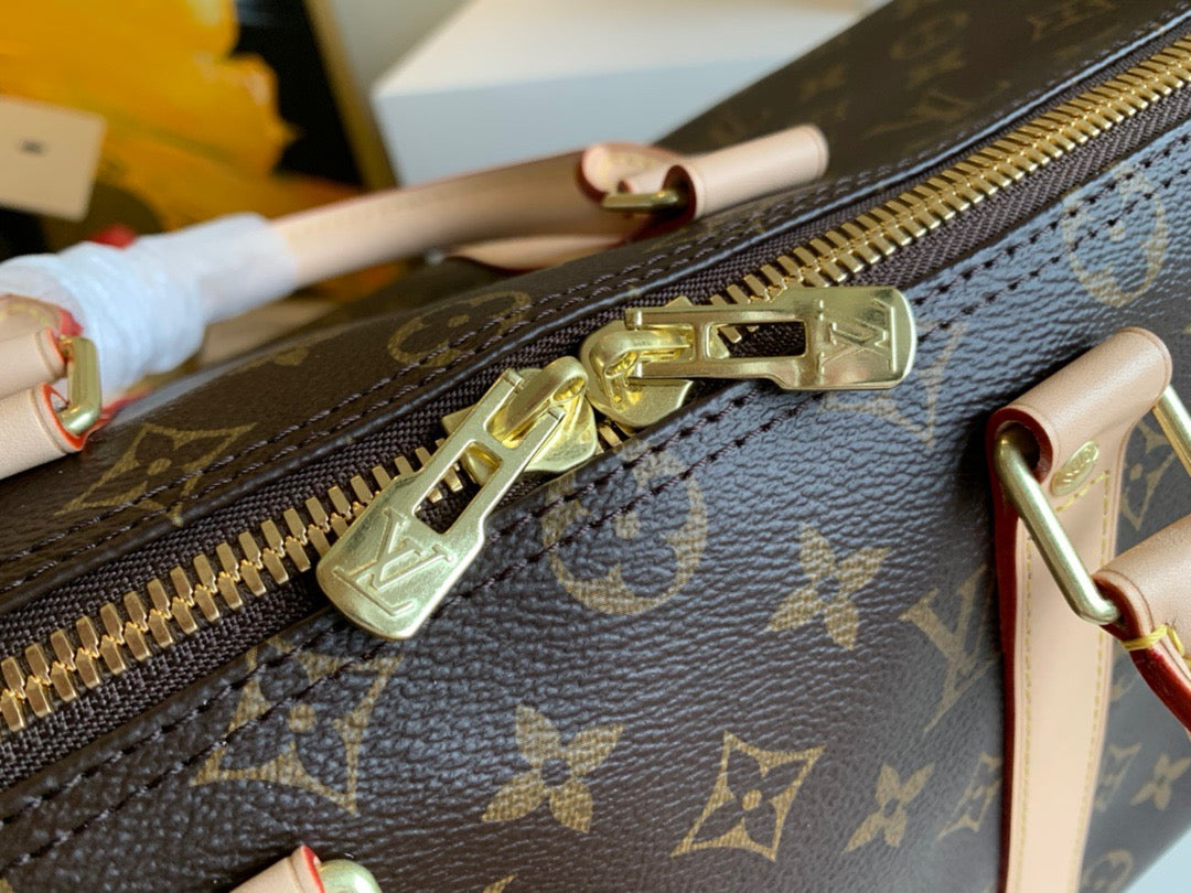 LV Keepall con bandolera monogram