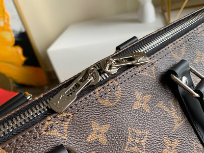 LV Keepall con bandolera