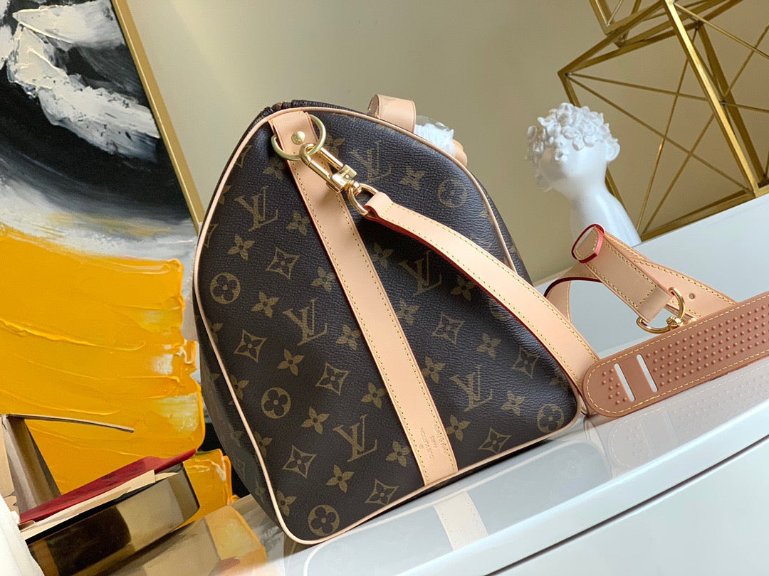 LV Keepall con bandolera monogram