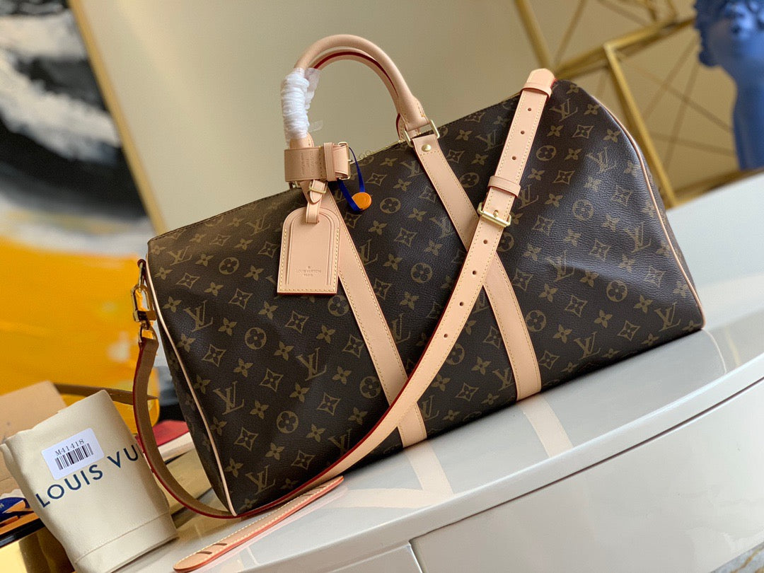 LV Keepall con bandolera monogram